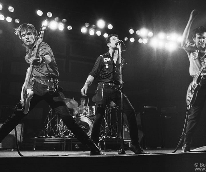The Clash were a great, powerful live band and this shot captures that energy and excitement.  I traveled with the Clash on their 1979 tour across the U.S. and feel this is the shot that shows them at their best.