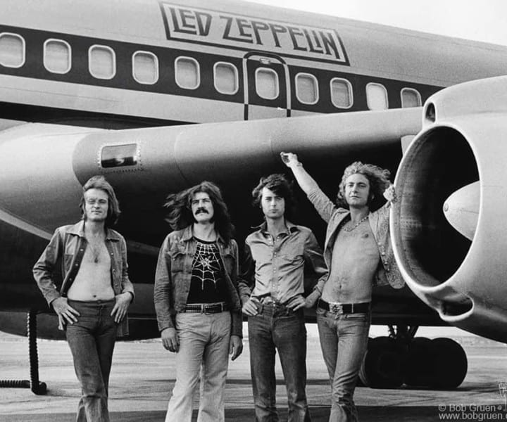 Led Zeppelin rented the Boeing 720 airplane for their 1973 tour. It had two bedrooms (one with an electric fireplace) and a brass bar with a piano built in. This photo represents the excess of the rock lifestyle in the 1970's.