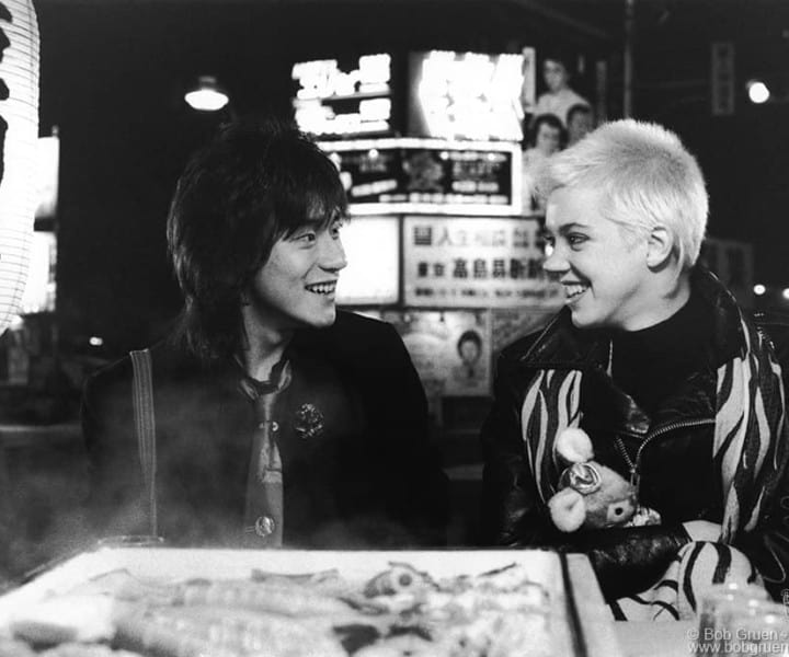 Yutaka Tadokoro and Carrie Hamilton, Tokyo, Japan. June 1987. <P>Image #: R-490 © Bob Gruen