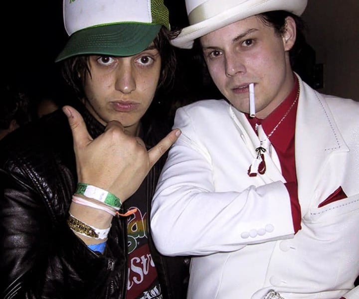 Julian Casablancas gets close to Jack White as the party continues at the Niagara bar on Ave A.