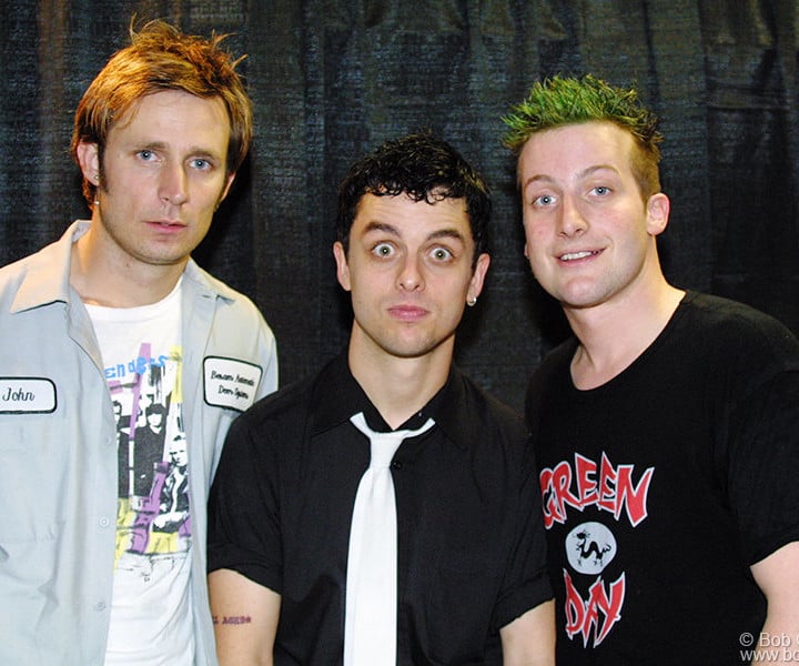 Green Day posed for a portrait backstage after the show. They are Mike, Billie Joe and Tre.