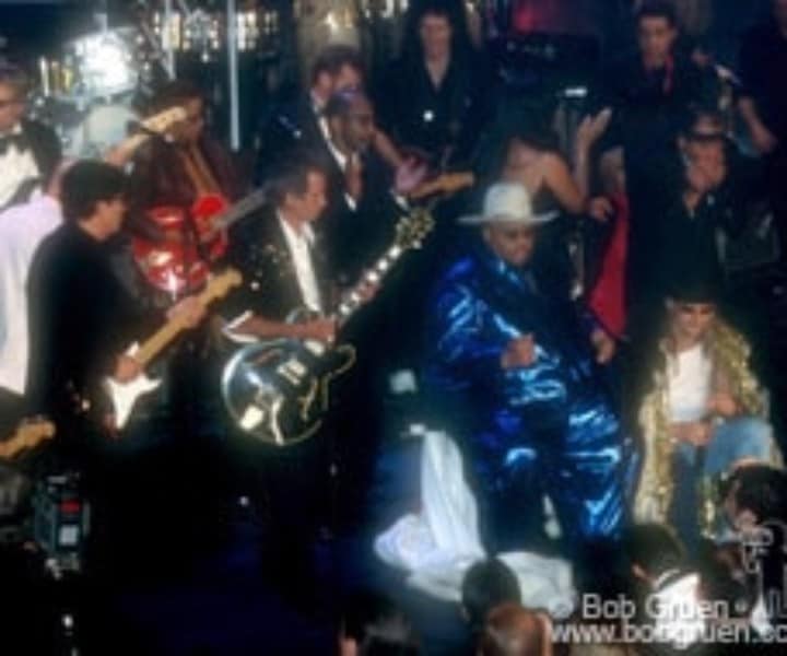 Robbie Robertson, Keith Richards, King Solomon Burke and Kid Rock with members of Queen and Aerosmith, join in the after dinner jam.