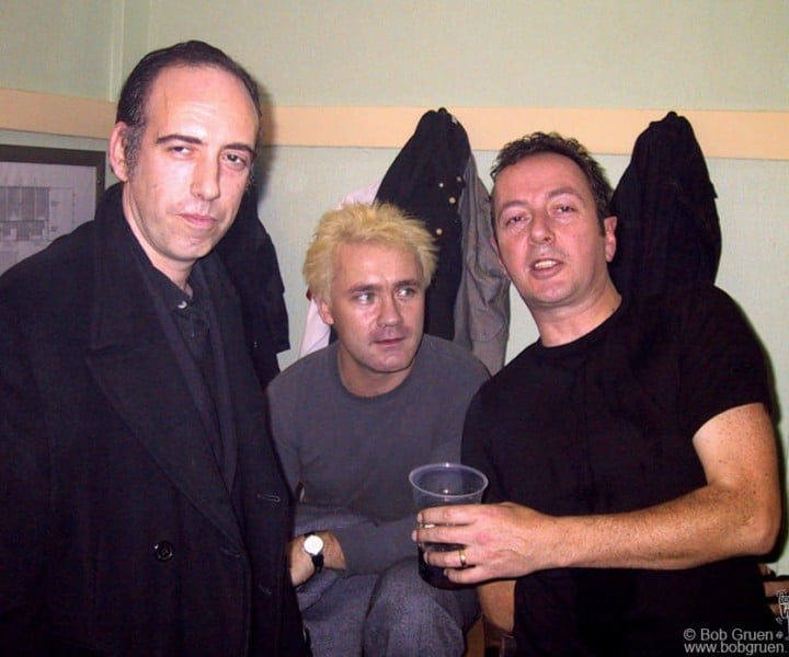 Nov 15 - London - Mick Jones and Damien Hirst visit with Joe Strummer backstage at London's Wembley Arena. 