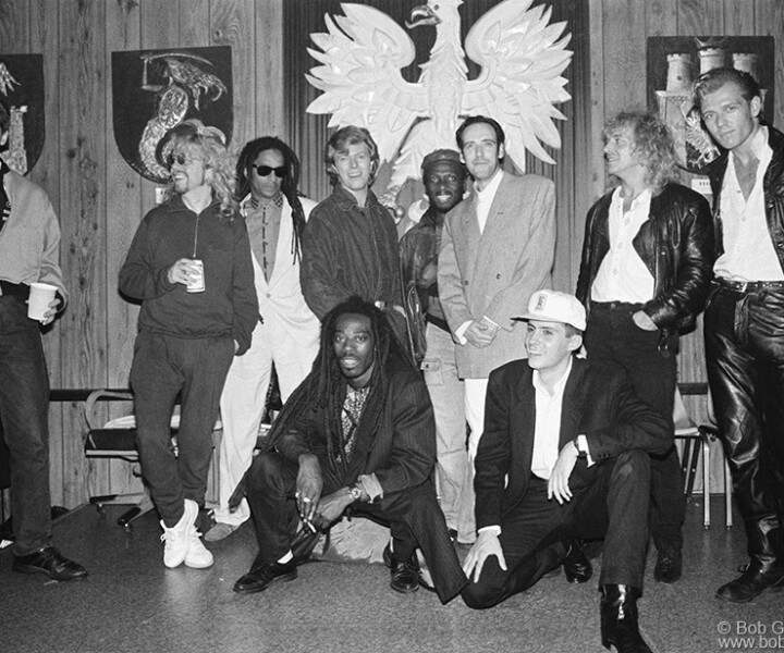 Greg Roberts, David Stewart, Leo Williams, Don Letts, David Bowie, Jimmy Cliff, Mick Jones, Dan Donovan, Peter Frampton and Paul Simonon, NYC. April 1987. Image #: BigAudioDynamite487_4-4a_1987 © Bob Gruen