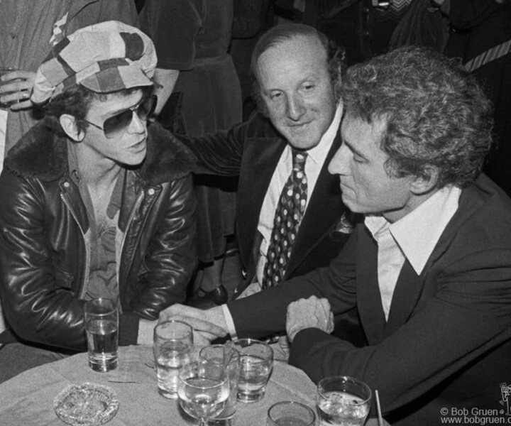 Lou Reed, Clive Davis and Ron Delsener, Feathers, NYC. November 12, 1976. <P>Image #: LouReed1176_1-24_1976  © Bob Gruen