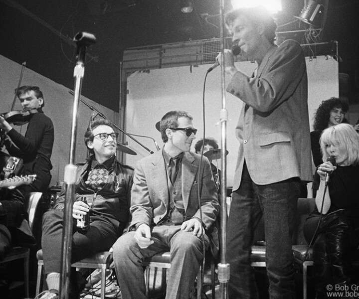 Chris Stein, Debbie Harry, Fred Schneider, Fred Smith and Glen O'Brien, Mudd Club, NYC. February 1980.  <P>Image #: GlennOBrien280_1-8_1980 © Bob Gruen