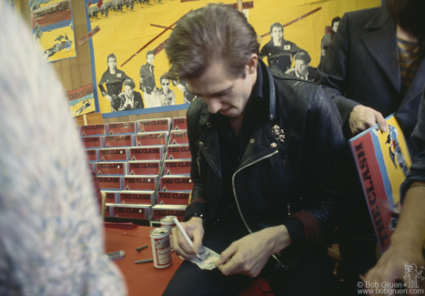 Paul Simonon of the Clash during an album signing at a record store in the USA. February 1979. Image #: Clash279_1979_33 © Bob Gruen Paul Simonon, USA - 1979