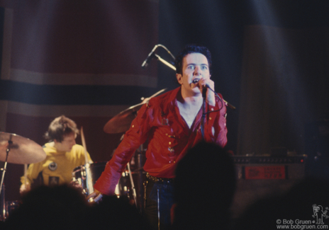 Topper Headon and Joe Strummer of the Clash on stage during their tour of the USA. February 1979. Image #: Clash279_1979_38 © Bob Gruen Topper Headon and Joe Strummer, USA - 1979