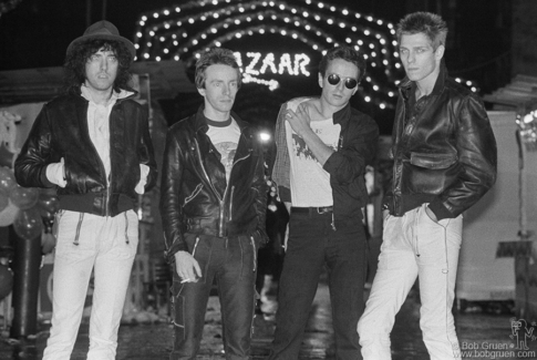 (L-R) Mick Jones, Topper Headon, Joe Strummer and Paul Simonon of the Clash at the San Gennaro Festival in NYC. September 1978. Image #: Clash978_4-4_1978 © Bob Gruen Clash, NYC - 1978
