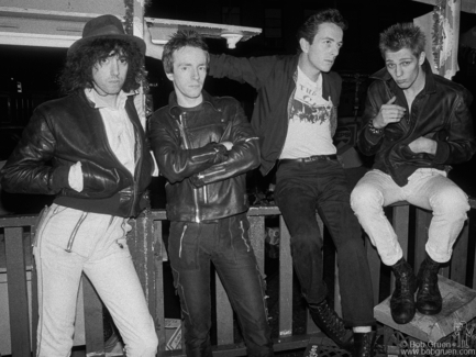 (L-R) Mick Jones, Topper Headon, Joe Strummer and Paul Simonon of the Clash at the San Gennaro Festival in NYC. September 1978. Image #: Clash978_5-5_1978 © Bob Gruen Clash, NYC - 1978