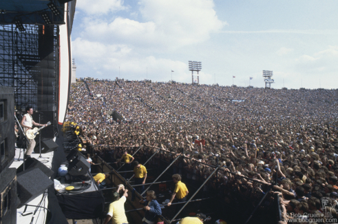 Mick Jones of the Clash on stage at JFK Stadium in Philadelphia, PA. September 25, 1982. Image #: Clash982_1982_9 © Bob Gruen Mick Jones, Philadelphia - 1982