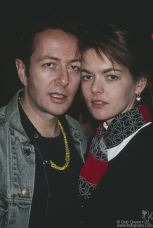 Joe Strummer and Lucinda Strummer posing in NYC. February 1994. Image #: JoeStrummer294_1994_1 © Bob Gruen Joe Strummer and Lucinda Strummer, NYC - 1994
