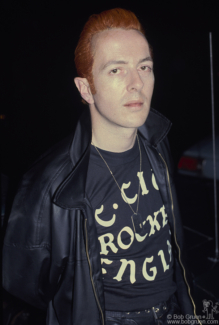 Joe Strummer posing on the streets of NYC. July 1985. Image #: JoeStrummer785_1985_8 © Bob Gruen Joe Strummer, NYC - 1985