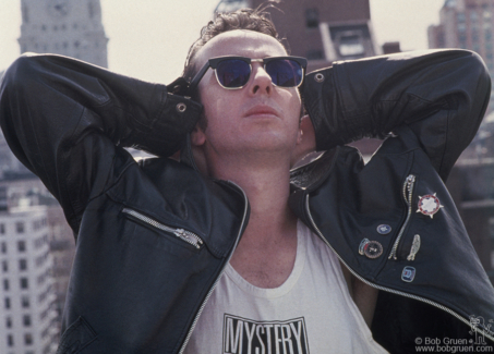 Joe Strummer of the Clash posing on the roof of the Gramercy Park Hotel in NYC. September 1989. Image #: JoeStrummer989_1989_7 © Bob Gruen Joe Strummer, NYC - 1989