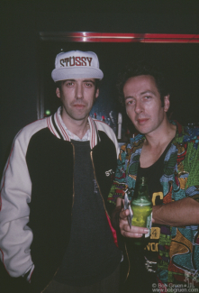 Mick Jones and Joe Strummer at Bank Club, NYC. September 1991. Image #: JoeStrummer991_1991_1 © Bob Gruen Mick Jones and Joe Strummer, NYC - 1991