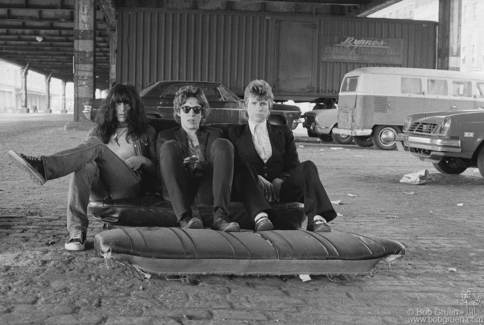 (L-R) Johnny Thunders, Richard Hell and Jerry Nolan of The Heartbreakers posing by a pier in NYC. June 30, 1975. Image #: Heartbreakers2-23a_1975 © Bob Gruen Heartbreakers, NYC - 1975